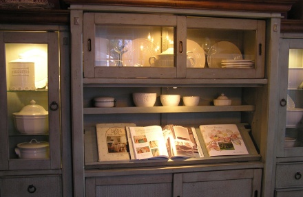 Cupboard with white pottery