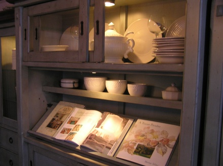 Cupboard with white bowls