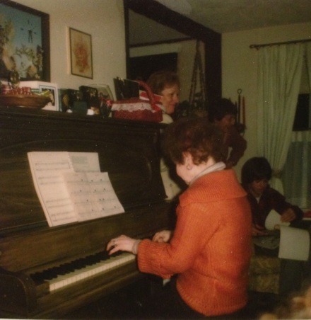 Lally at the piano