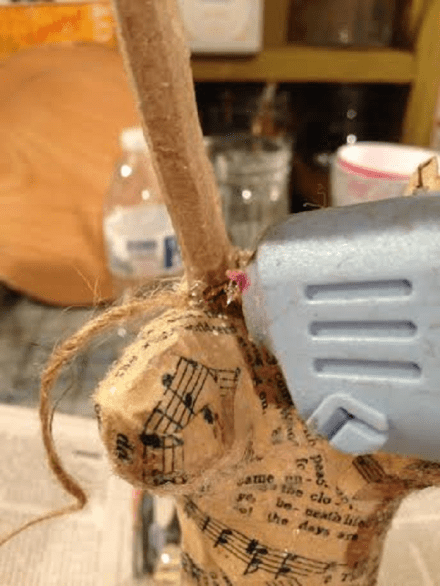 Anchoring twine to antler with glue gun